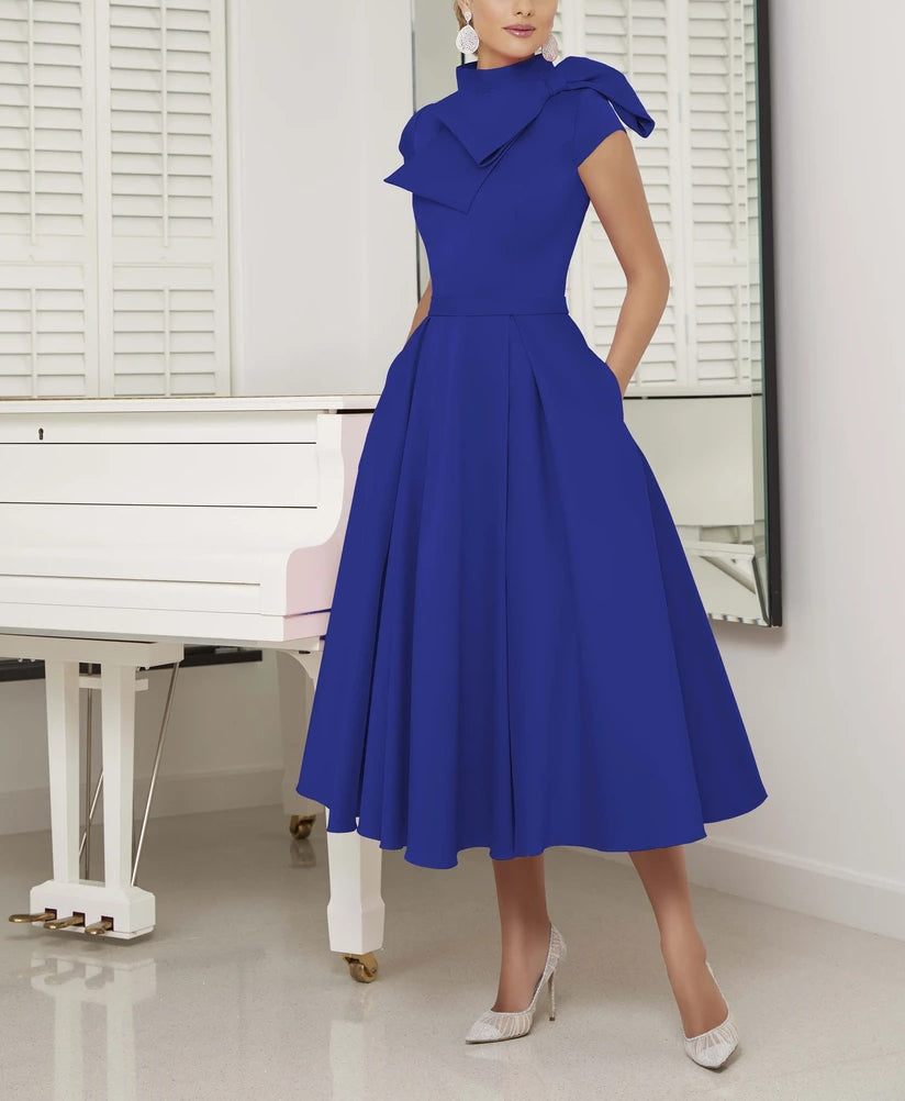 The bow-embellished retro bridal dress